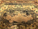 a large oriental rug on the floor in a room