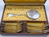 a box with a set of silverware inside of it