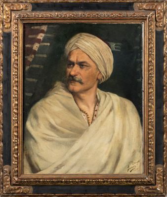 a painting of a man with a turban in a gold frame