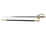 a pair of swords with a wooden handle and brass fittings