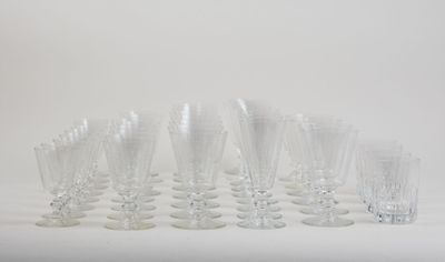 a lot of empty wine glasses sitting on a table
