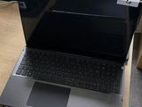 two laptops that are sitting on a table