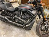 a motorcycle that is parked in a garage