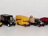 several toy trains are lined up on a white surface