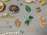 many different types of jewelry on the table