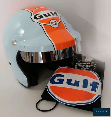 a helmet that is sitting on a table with a tag