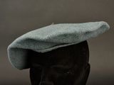 a hat on a mannequin head on a table