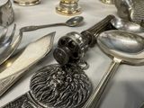 a table with silverware and silverware on it
