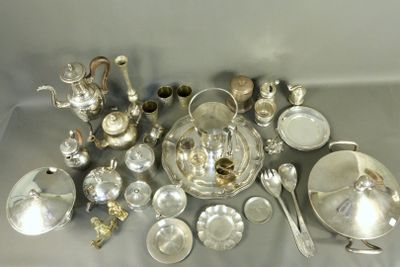 a lot of silver items that are on a table
