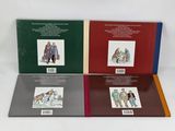 three children ' s books with pictures of people and animals on them