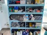 a view of a room with a lot of items on the shelves