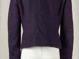 an image of a male mannequin wearing a purple jacket and white pants