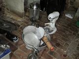 a kitchen with a brick floor and a brick stove