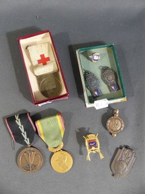 a small box with medals and other items in it