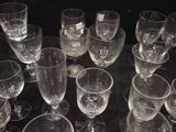 a lot of empty wine glasses on the table