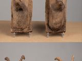 four different views of a sculpture of a goat ' s head on a table