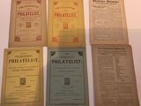 six old philaelist books on a white table