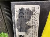 an image of a close up of a parking ticket attached to a motorcycle