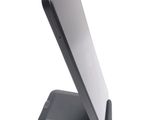 a cell phone that is sitting on a stand