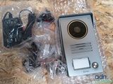 an image of a video door phone and other accessories