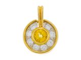 un pendentif composé d'un saphir jaune et de diamants sur fond blanc