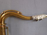 a saxophone that is sitting on top of a table
