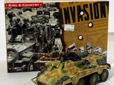 toy army vehicles are sitting in front of a boxed box