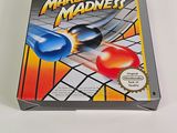 a box of marbles on a white table