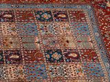an oriental rug with a patchwork design on it