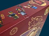 a red box with legos on it on a blue background