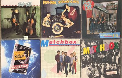 several different album covers of various people in a room