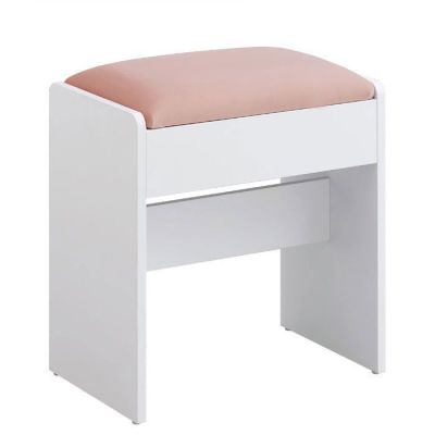 a white bench with a pink cushion on top of it