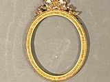 a gold ring with a crown on top of it
