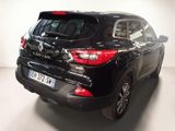 a picture of a black suv parked in a room