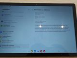 an image of a tablet computer sitting on top of a wooden table