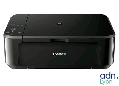 une imprimante Canon sur laquelle figure le logo Canon