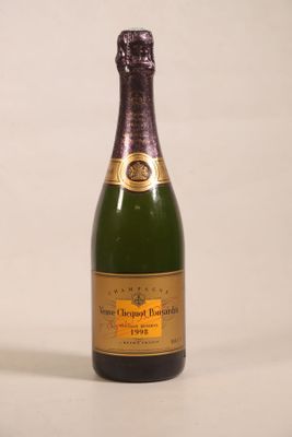 a bottle of champagne that is sitting on a table