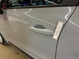 a car with a sticker on the door of it