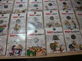 a lot of comics on the table together