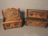 two wooden benches sitting next to each other on a table