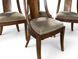 three wooden chairs with upholstered upholstered seats on a white background