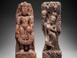 une paire de statues représentant une femme et un homme