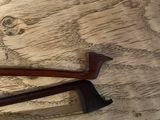 a pair of scissors sitting on a wooden table