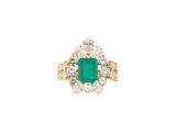 an emerald and diamond ring