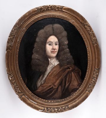portrait of a man in a brown coat and a brown cloak