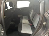 the back seats of a car with a seat belt in the back of it