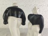 pair of black and white figurines of a man and a woman
