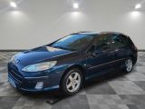 a picture of a blue car parked in a garage