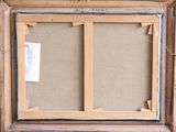 a close up of a picture frame with a piece of paper taped to it