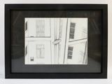 a picture of a black and white picture of a building